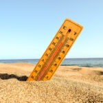 closeup-shot-thermometer-beach-sand